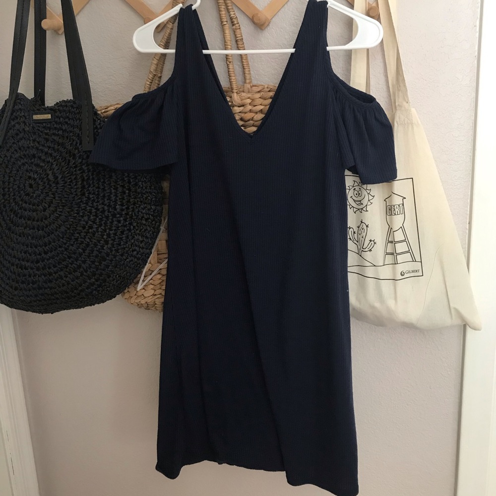 Dark blue sweater dress with cutout shoulders